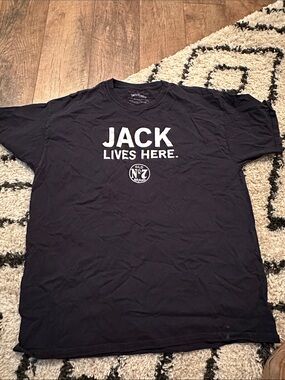 Jack Daniels Black Graphic Tee with White 'JACK LIVES HERE.' Print